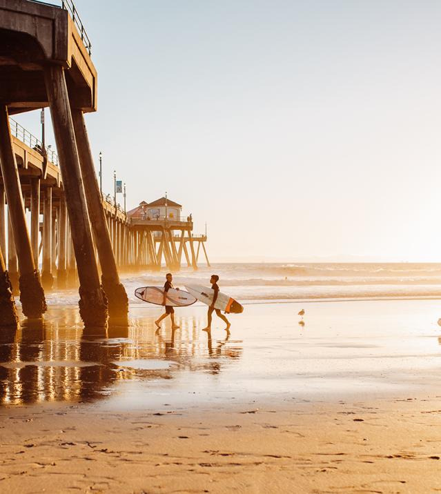 Surfing in Huntington Beach at the Huntington Beach Pier